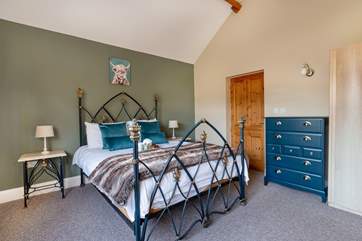 Stylish bedroom 1 with king size bed and ensuite