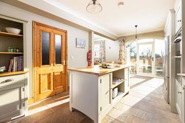 The kitchen leads out to the garden.