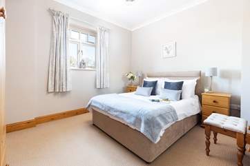 This bedroom is a lovely king room.
