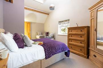 Bedroom 4 has a king-sized bed and a single day bed.