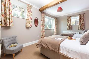 Ground floor bedroom 1 has a double bed and a single bed.