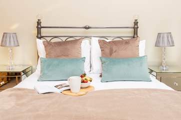 Bedroom 2 is a lovely room, with cosy throws and sumptuous linens.