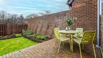 An additional garden which is enclosed and situated just off the living area.