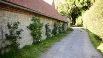 The private drive leading down towards South Barn.