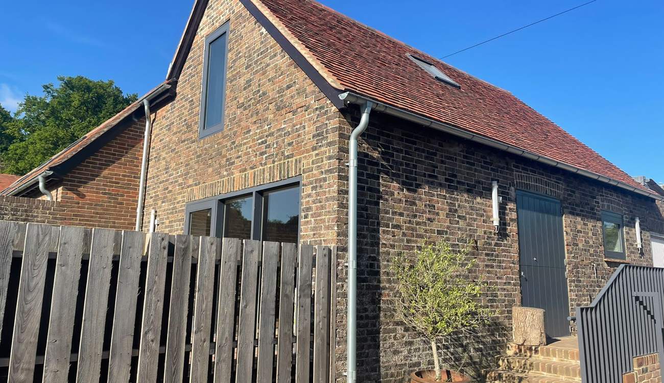 A couple of steps lead to the front door.