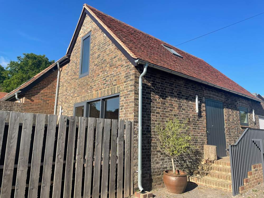 A couple of steps lead to the front door.