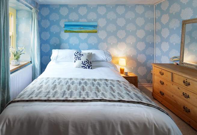 Calming pastel blues in bedroom 2 on the ground floor.