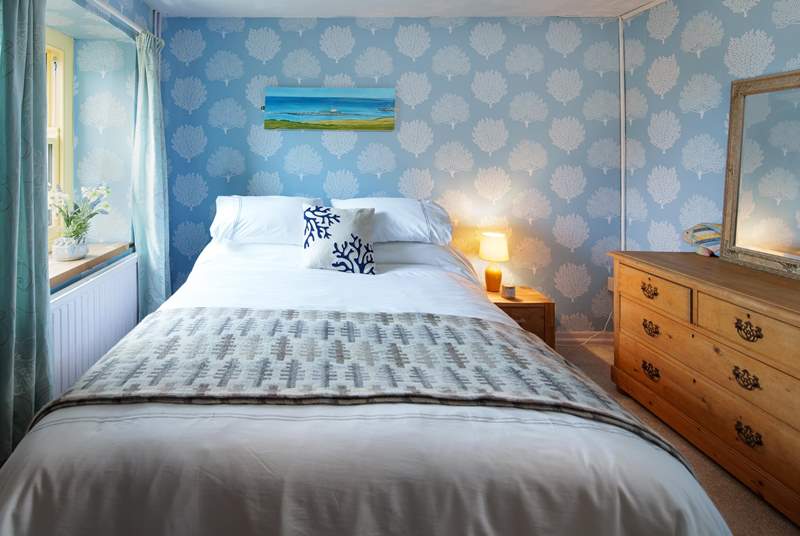 Calming pastel blues in bedroom 2 on the ground floor.