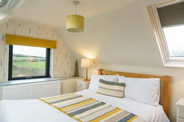 Gorgeous views of the rolling meadows and the sea from Bedroom 3 on the first floor.