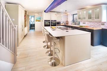 The stylish open plan kitchen - ideal for sociable suppers!