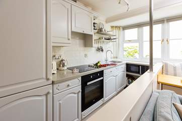 The compact kitchen has all you need to cook a holiday meal.
