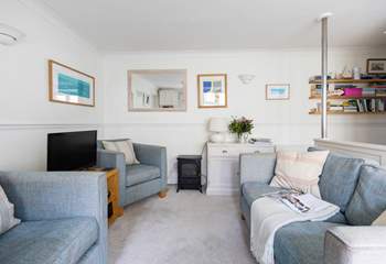 The open plan living area is cosy throughout the year.
