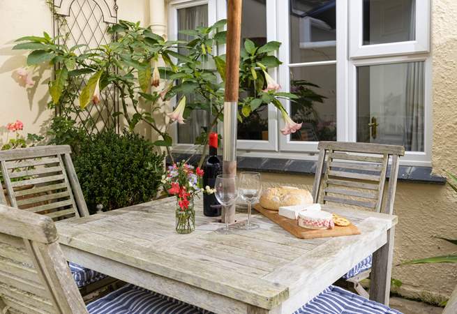 Enjoy al fresco dining, conveniently just outside your front door.