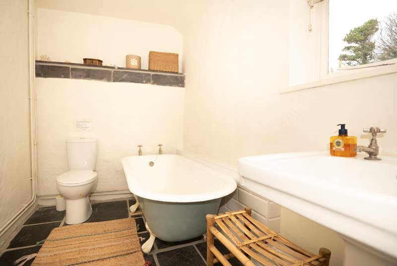 Family bathroom on the lower ground level, with free-standing bath and shower.