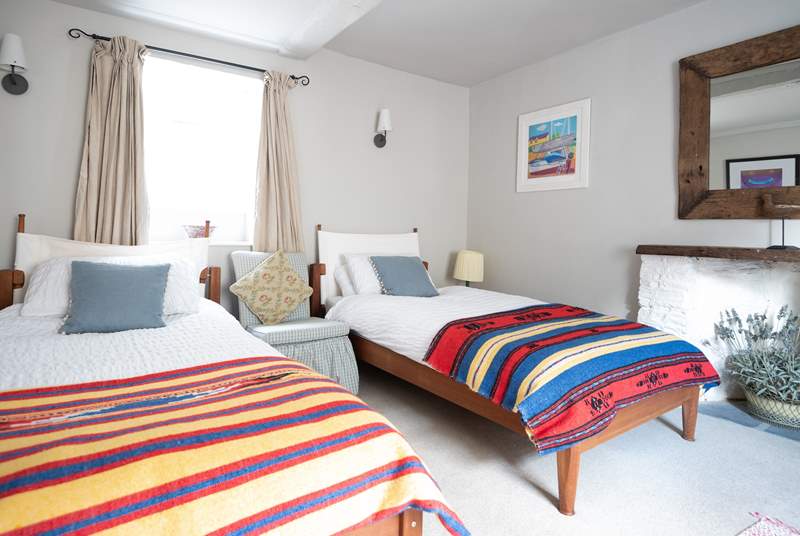 Bright and cheerful twin room on the lower ground level.