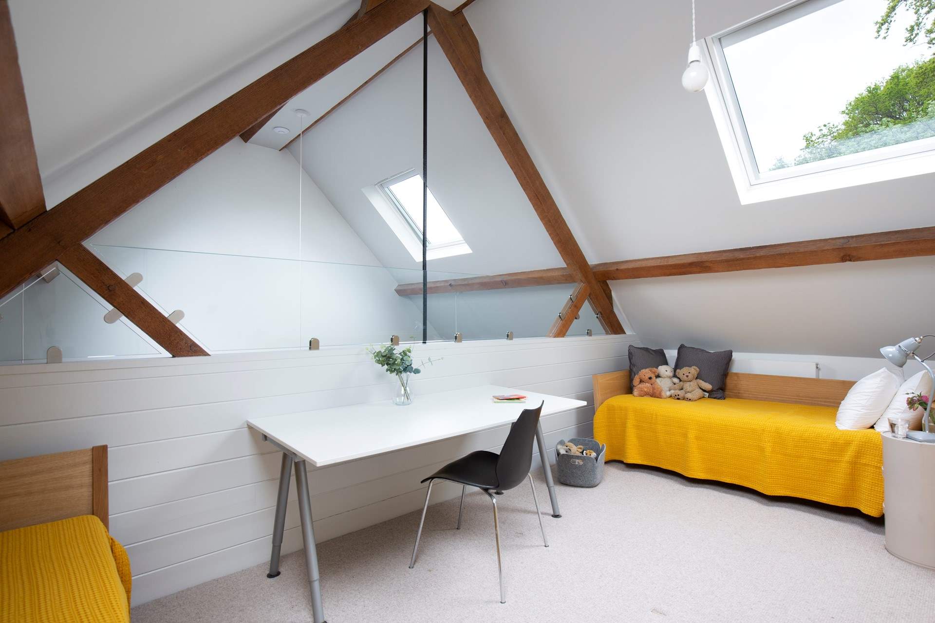 Stairs lead to the twin room on the mezzanine floor, which is lovely and bright.