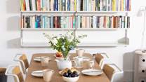The dining-table sits four.
