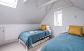 This twin room in South Barn is relaxing and contemporary. - Thumbnail Image