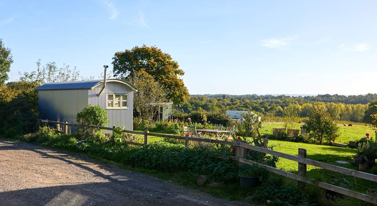 Parking is opposite the barn along side this fence which borders the neighbour's property.