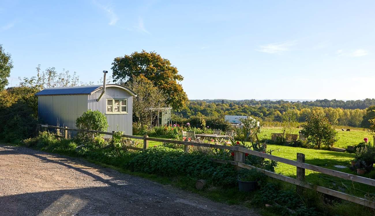 Parking is opposite the barn along side this fence which borders the neighbour's property.