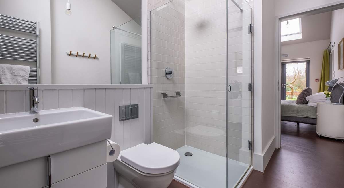 The en suite bathroom with bath and shower.