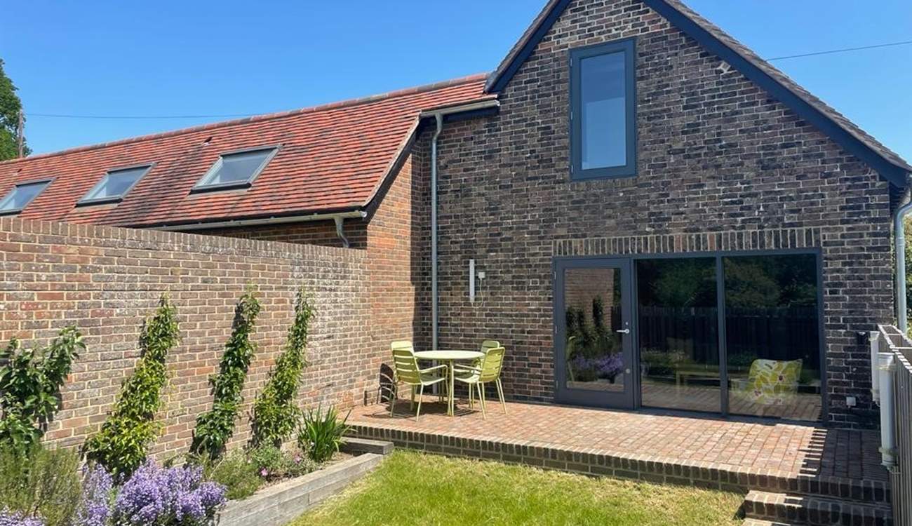 The secure garden in South Barn is perfect for guests bringing a dog.