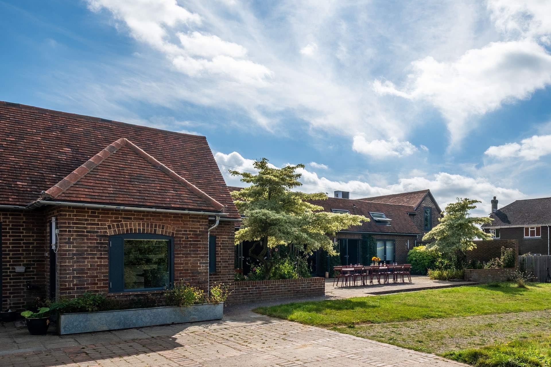 A cleverly designed interconnected barn situated on a 120-acre working farm.