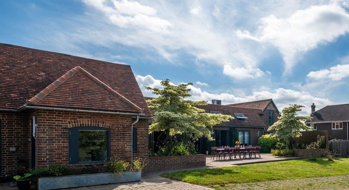 A cleverly designed interconnected barn situated on a 120-acre working farm.