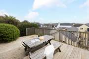 Tucked away in the centre of St Mawes, Spinnakers has a delightful terrace with views towards the Carrick Roads.