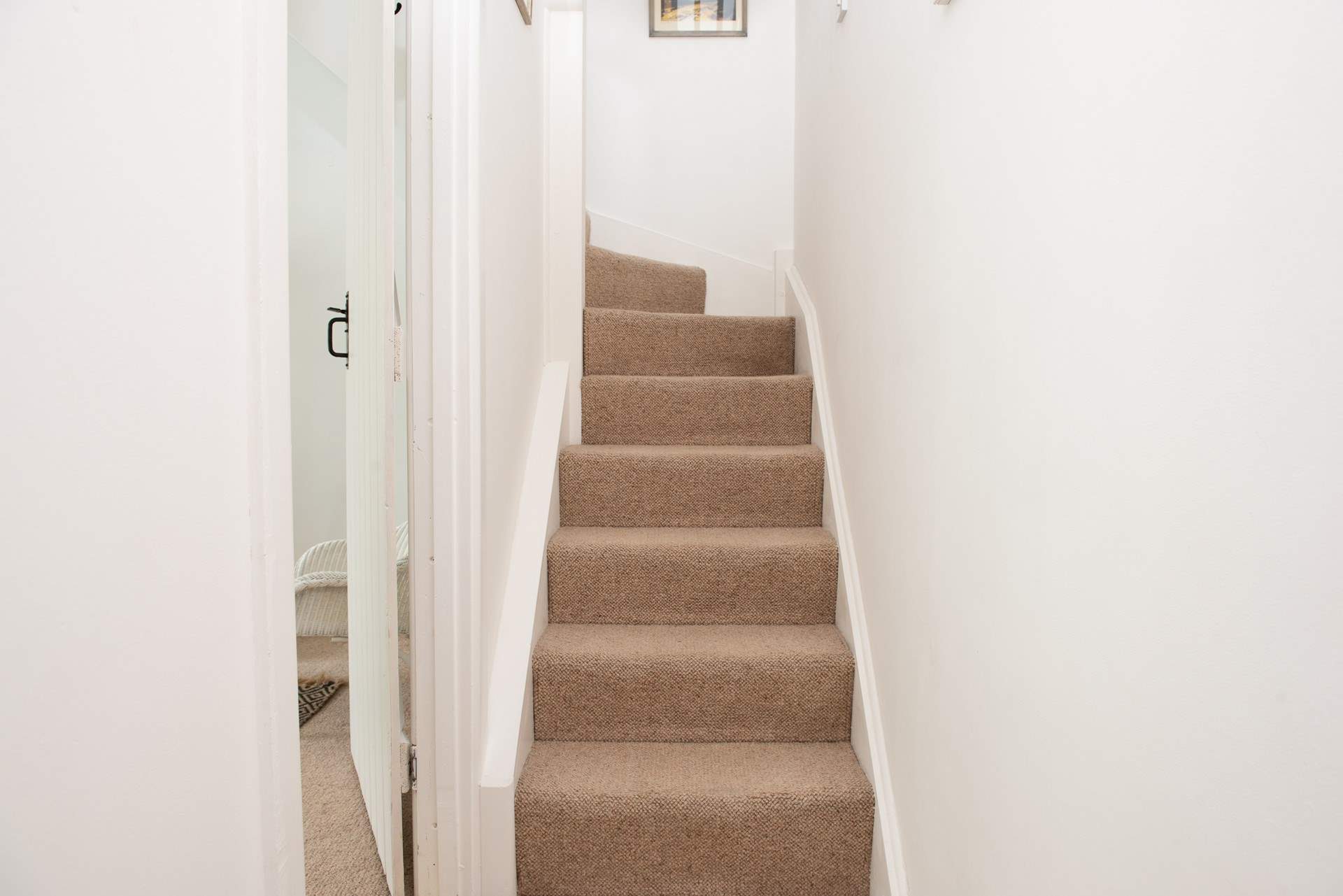 The turning stairs lead to the second floor, bedroom 3 is on the second floor.