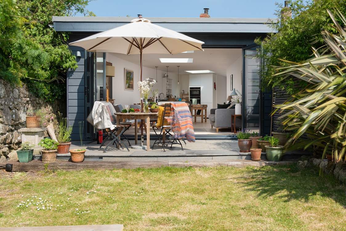 The very essence of holiday living, fold back the bi-fold doors and let the Cornish summer breeze in.