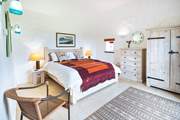 Spacious bedroom 4 with splendid sea views and access to the patio,.