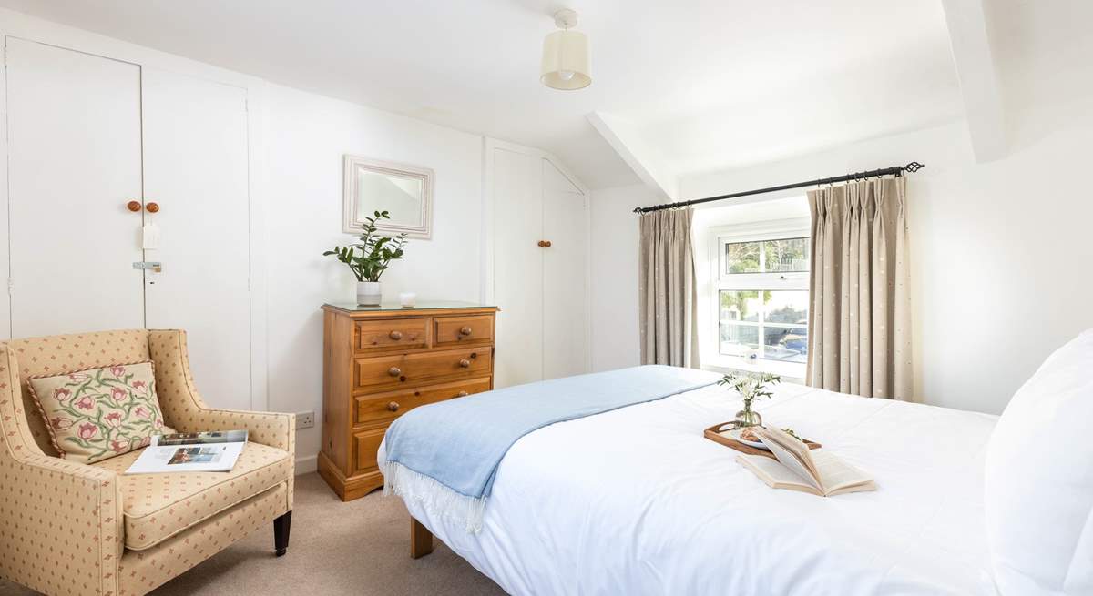 The pretty main bedroom on the first floor.