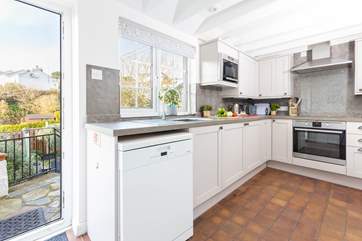 The light and bright kitchen has all the equipment you will need to cook a holiday meal.