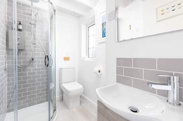 The swish shower-room is on the ground floor, ideal for rinsing salty toes.