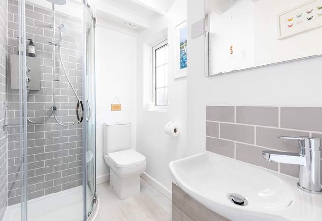 The swish shower-room is on the ground floor, ideal for rinsing salty toes.