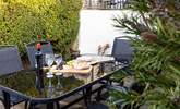 Al fresco dining on the sheltered patio, it's what holidays are made for. - Thumbnail Image