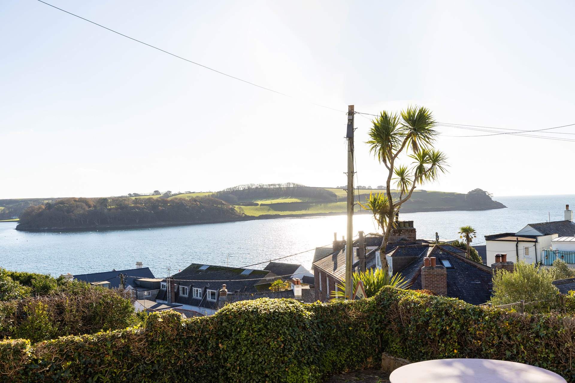 Watch the tide ebb and flow and the boats sail past from the front elevation.