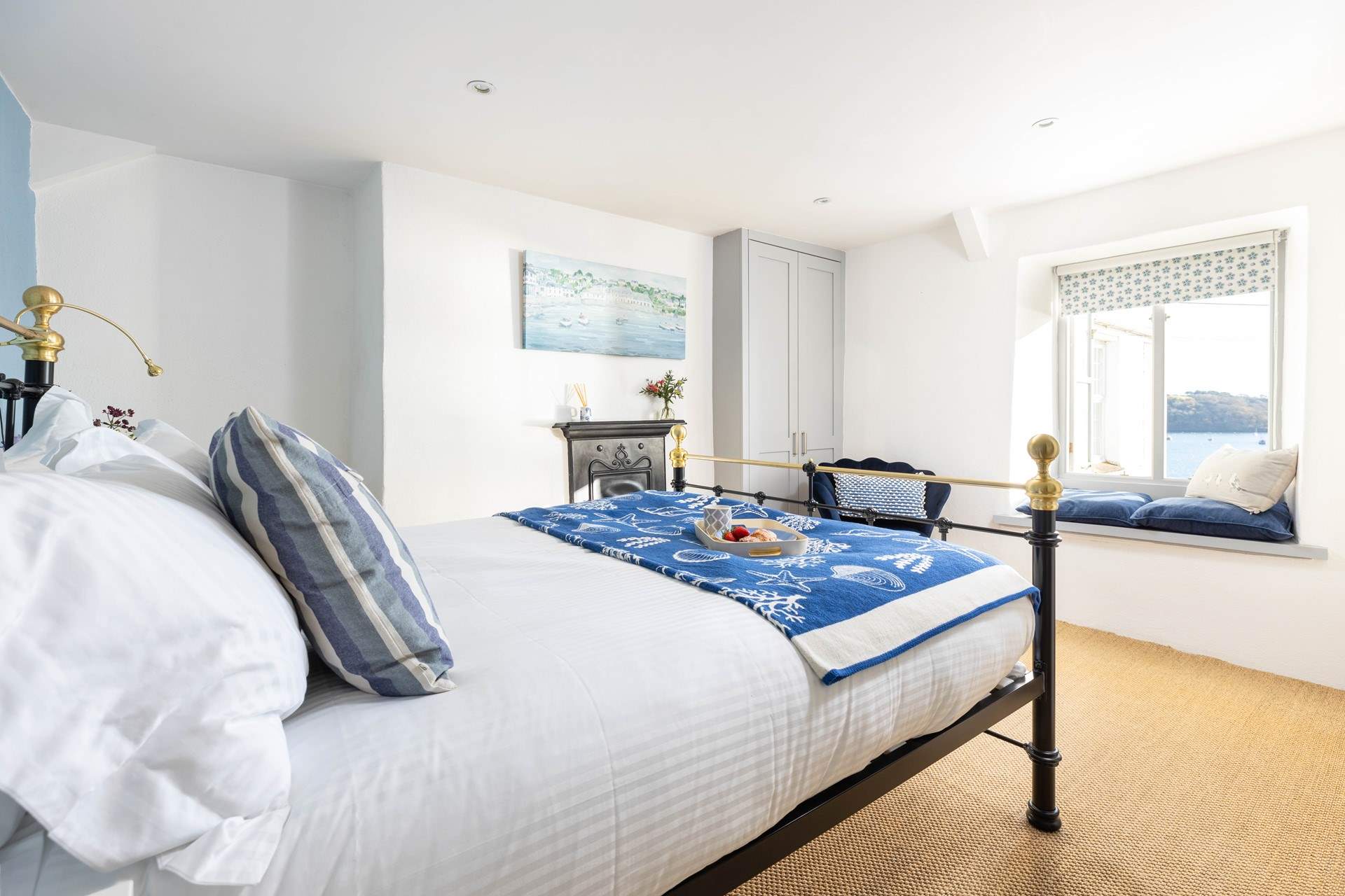 The pretty double bedroom has a king-size bed for a restful night.