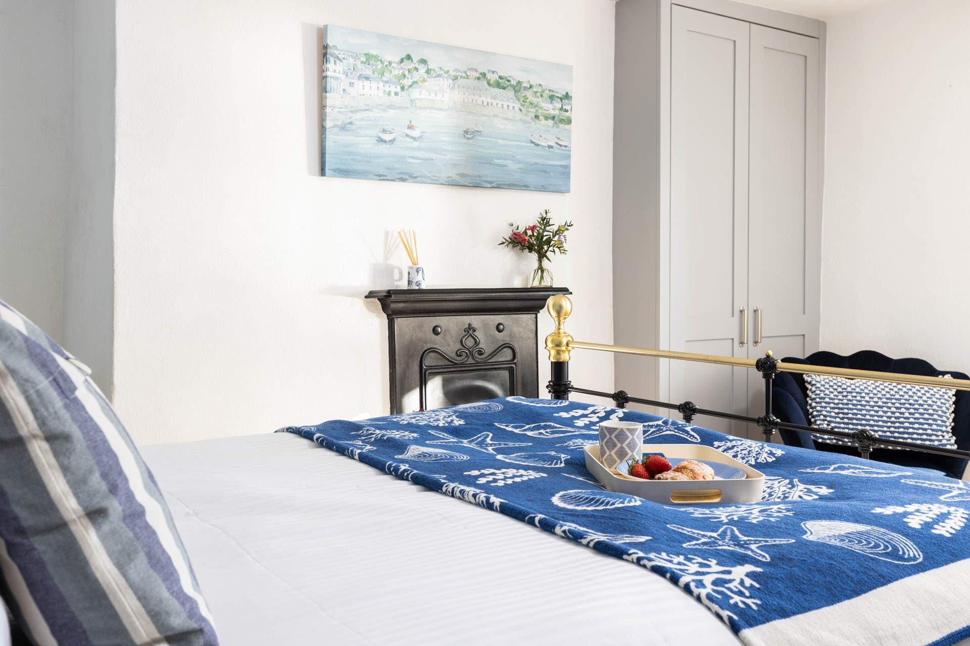 There is a lovely ornamental fireplace in the double bedroom.