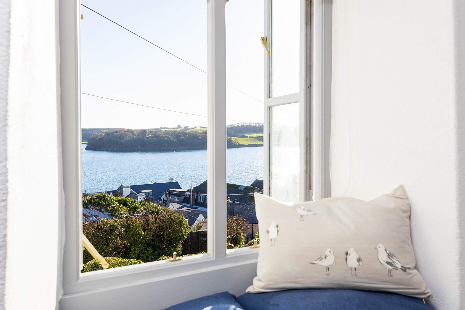 Sit on the window seat in the double bedroom and take in the gorgeous views.