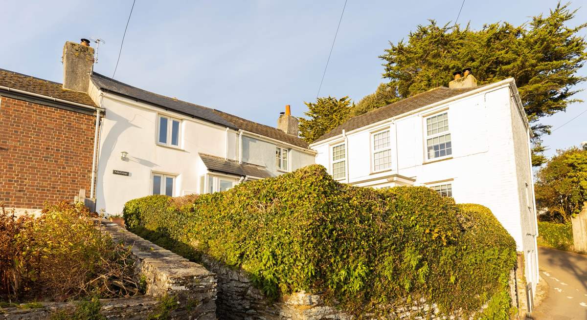 Charming Chapel Cottage is found up the short flight of steps and along the path to the cottage tucked in the corner.