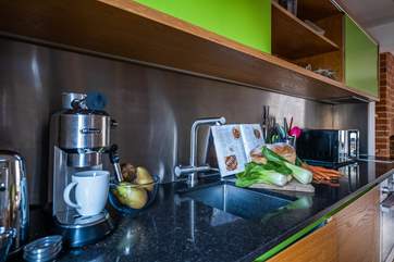 The stylish kitchen with your very own De'Longhi coffee machine