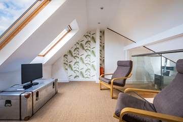 There is a television in the mezzanine snug.