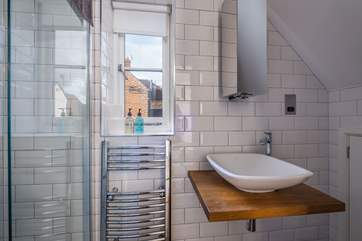 There is a shower-room next to the bedrooms.