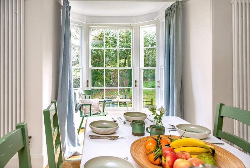 A wonderfully light and airy room with views over the front garden.