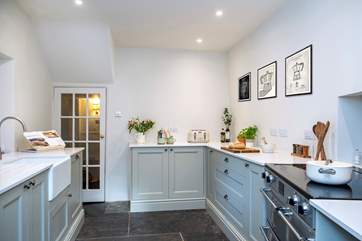 The sleek and stylish kitchen/breakfast-room.