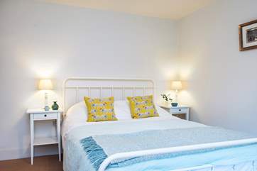 Snuggle up under the covers of your king-size bed in bedroom 2.