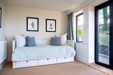 Bedroom 5 can be set up as a single or double bed but if you don't need the extra beds, it becomes a wonderful space to enjoy the garden with access to the terrace and garden at the back. This room is accessed internally from the first floor corridor.