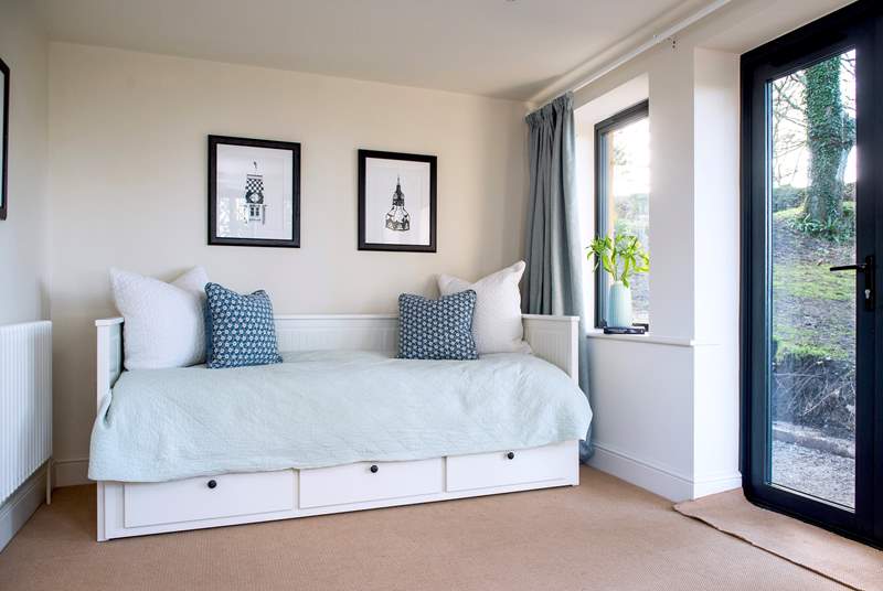 Bedroom 5 can be set up as a single or double bed but if you don't need the extra beds, it becomes a wonderful space to enjoy the garden with access to the terrace and garden at the back. This room is accessed internally from the first floor corridor.
